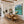 Swimmers by a Jetty on a Mountain Lake Wall Art styled interior scene 5 | OILDECO