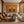 Golden Hat Dancers Beneath a Blue Sun Wall Art styled interior scene 2 | OILDECO