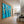 Four Swimmers in Brilliant Turquoise Water Wall Art styled interior scene 3 | OILDECO
